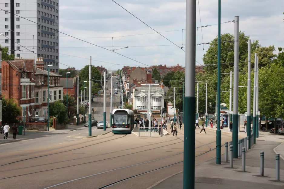 Nottingham tram line Blue with low-floor articulated tram 214 "Dennis McCarthy, MBE" at The Forest (2011)