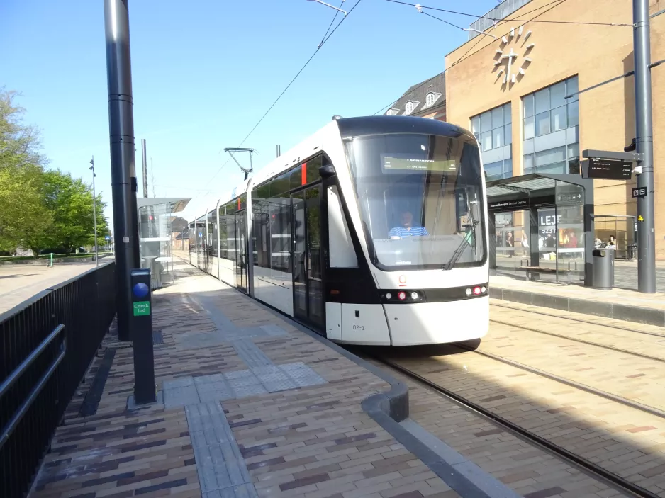 Odense low-floor articulated tram 02 "Kompasset" at Banegården/Central Station (2022)