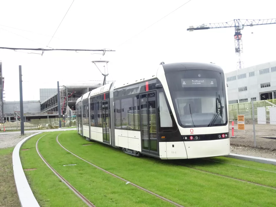 Odense low-floor articulated tram 11 "Hjemkomsten" near SDU Syd / Hospital Nord (2021)