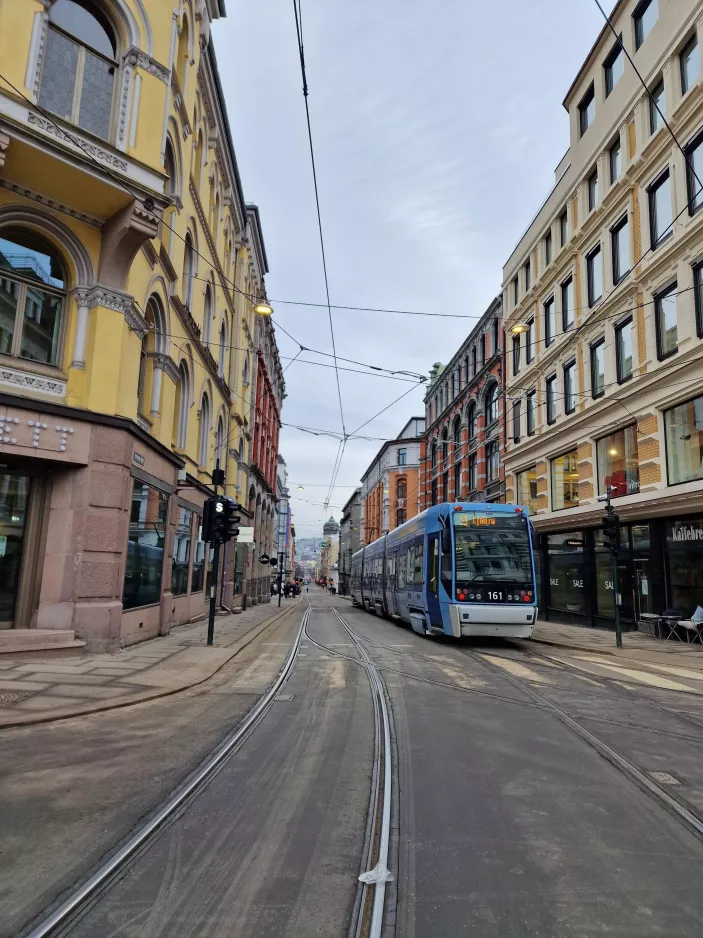 Oslo tram line 13 with low-floor articulated tram 161 on Prinsens gate (2023)