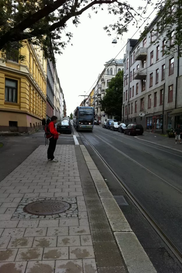 Oslo tram line 18 with low-floor articulated tram 171 on Thereses gate (2011)