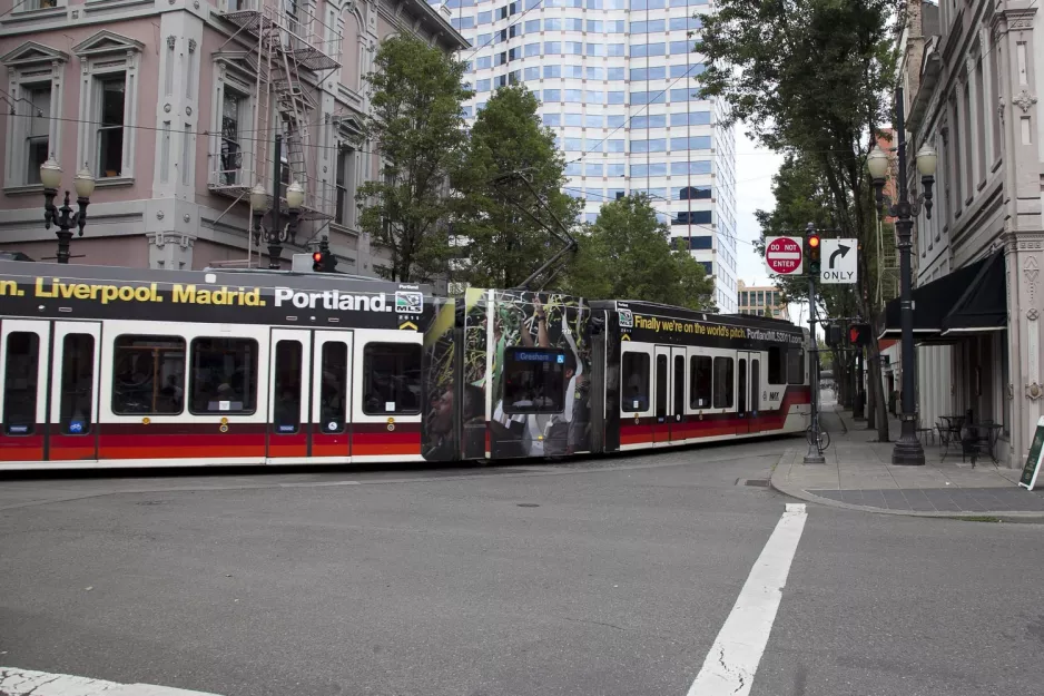 Portland regional line Blue with low-floor articulated tram 237 on Northeast 1st Avenue (2010)