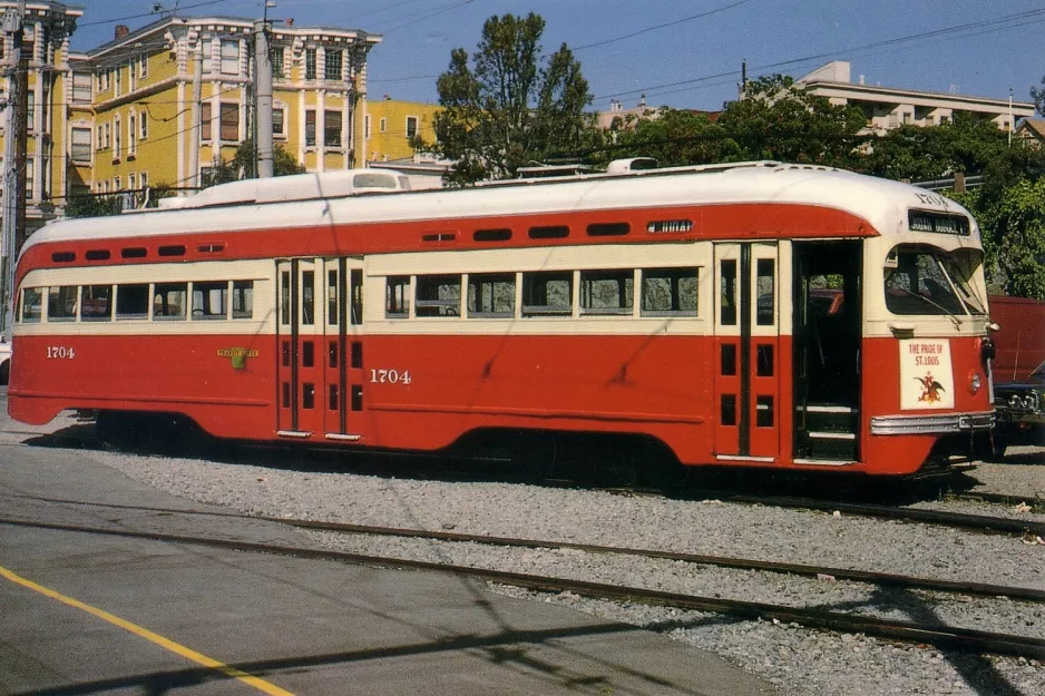 Postcard: San Francisco E-Embarcadero Steetcar with railcar 1704 near Church & Duboce (1985)