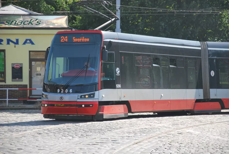 Prague tram line 24 with low-floor articulated tram 9206 in the intersection Nábřeží Edvarda Beneše/Štefánikův Most (2015)