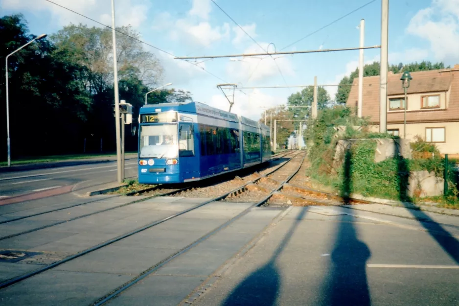 Rostock tram line 12 with low-floor articulated tram 667 on Hamburger Str. (1995)