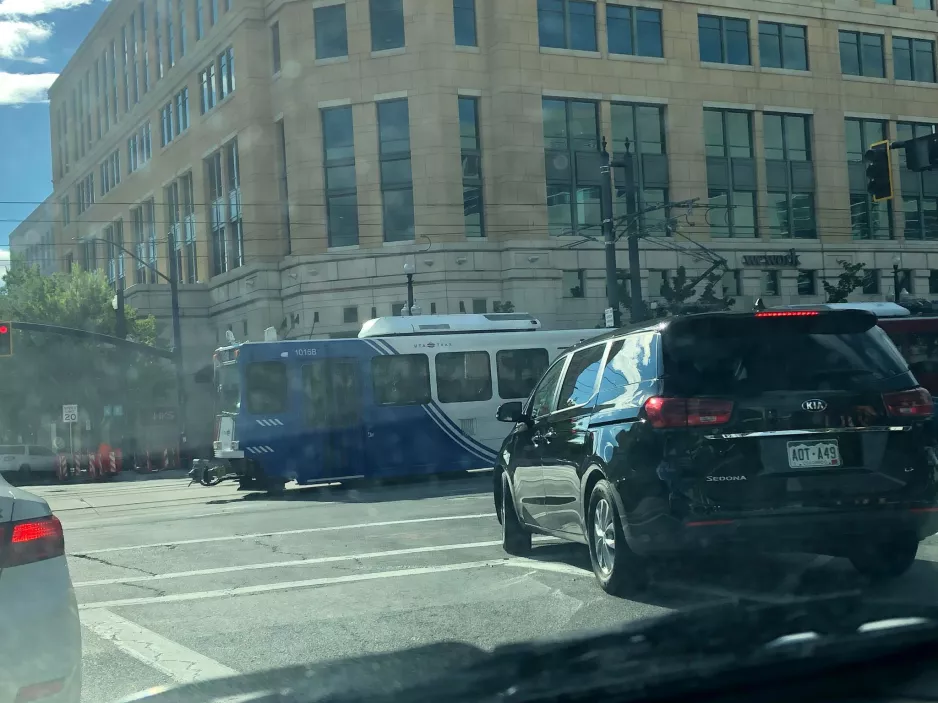 Salt Lake City regional line 701 Blue Line with articulated tram 1015 at Planetarium (2022)