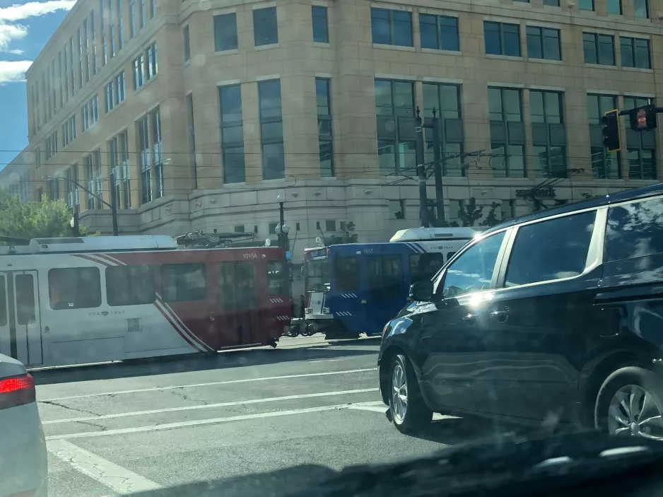 Salt Lake City regional line 701 Blue Line with articulated tram 1015 close by Planetarium (2022)