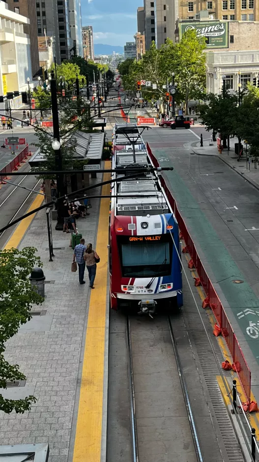 Salt Lake City regional line 704 Green Line with articulated tram 1176 at City Center (2022)