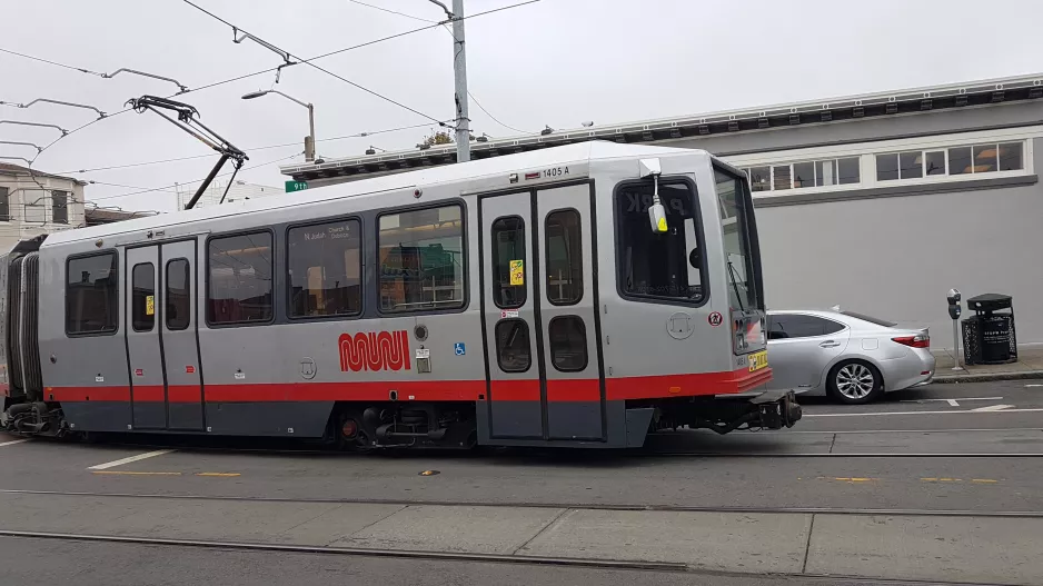 San Francisco tram line N Judah with articulated tram 1405 in the intersection 9th Avenue & Irving Street (2021)