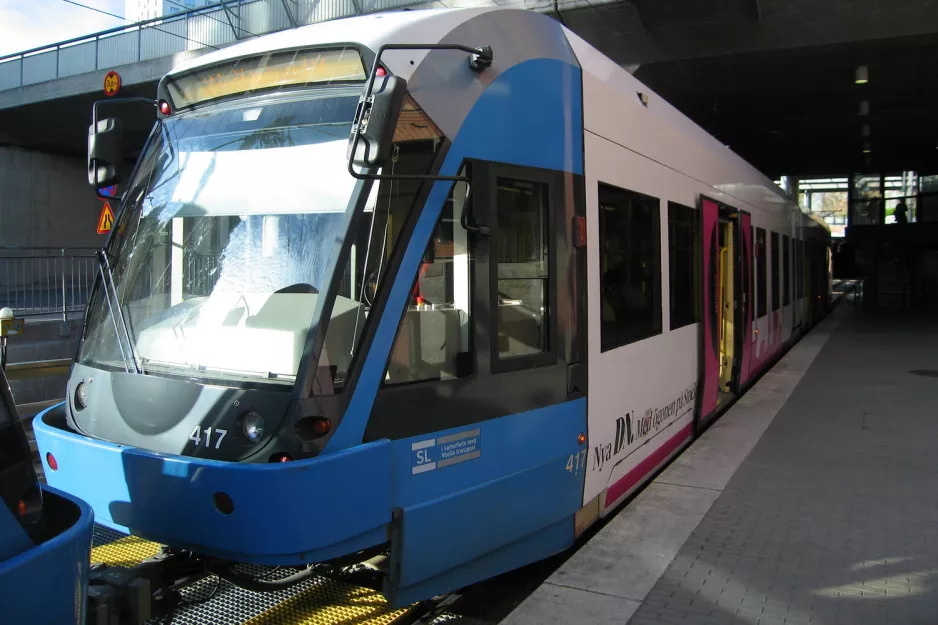 Stockholm tram line 30 Tvärbanan with low-floor articulated tram 417 at Alvik (2011)