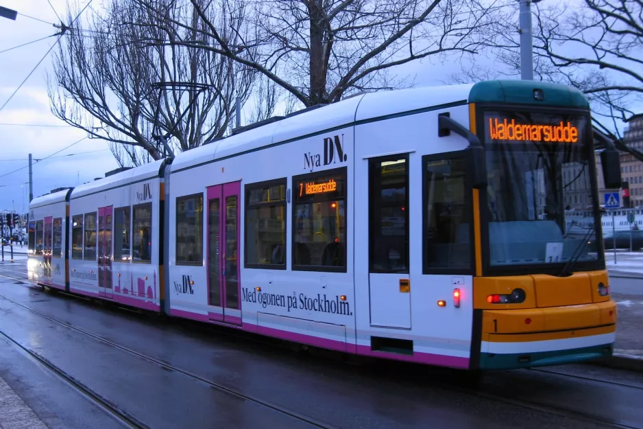 Stockholm tram line 7S Spårväg City with low-floor articulated tram 1 on Nybroplan (2012)