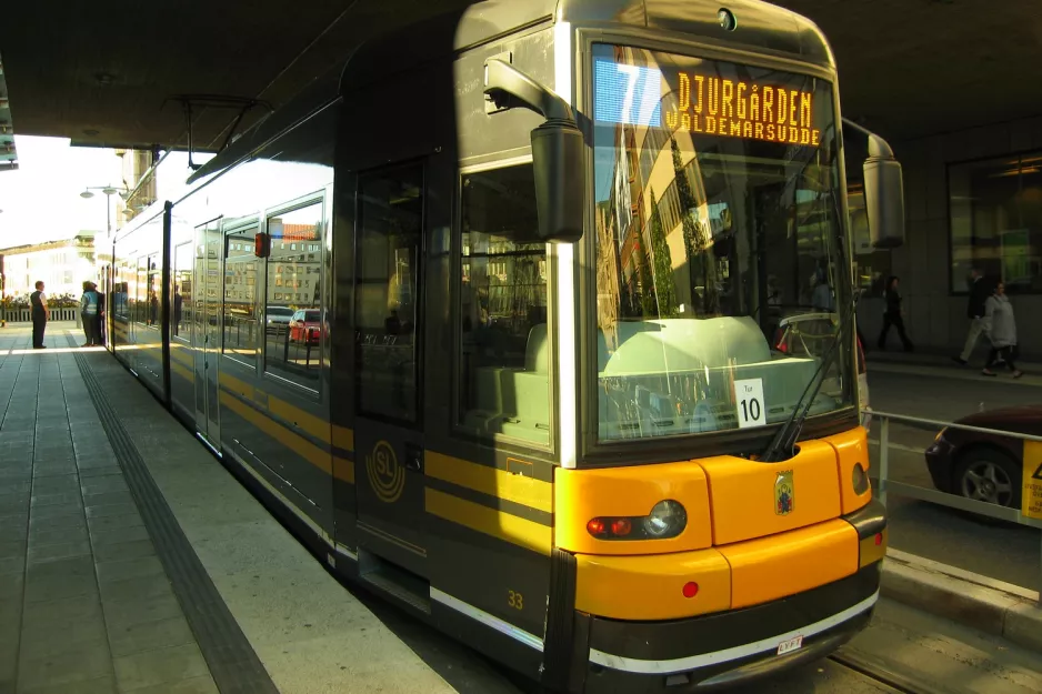 Stockholm tram line 7S Spårväg City with low-floor articulated tram 33 at Sergels torg (2011)