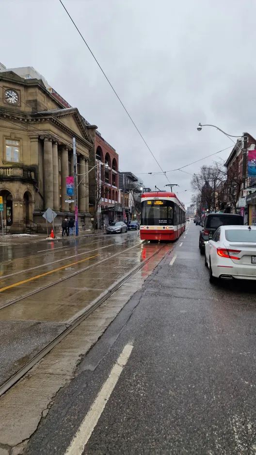 Toronto tram line 501 Queen with low-floor articulated tram 4545 at Queen St E at Saulter St E Side (2025)