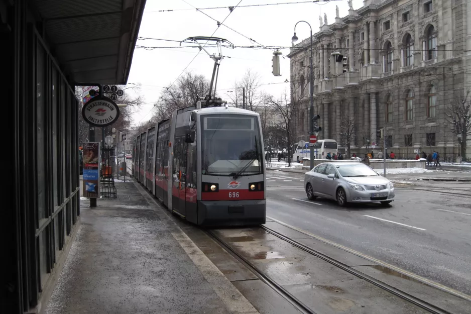 Vienna tram line 2 with low-floor articulated tram 696 at Burgring (2013)