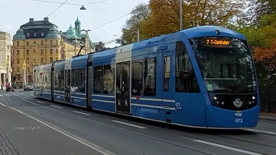 Stockholm. Tram City, and Djurgårdslinjen at Nybroplan, tram A35B from CAF. City tram. Text